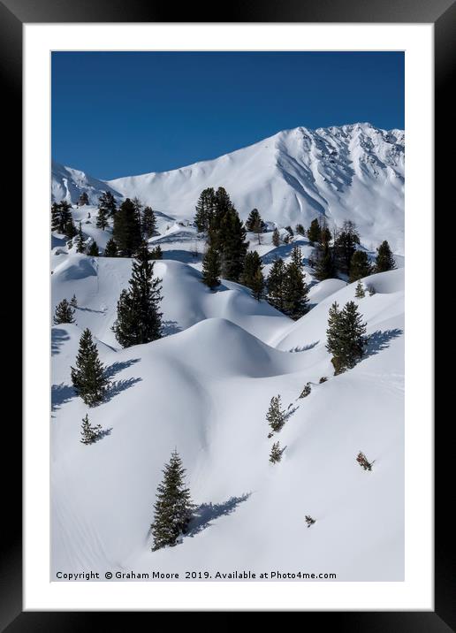 Undulating snowy mountainscape Framed Mounted Print by Graham Moore