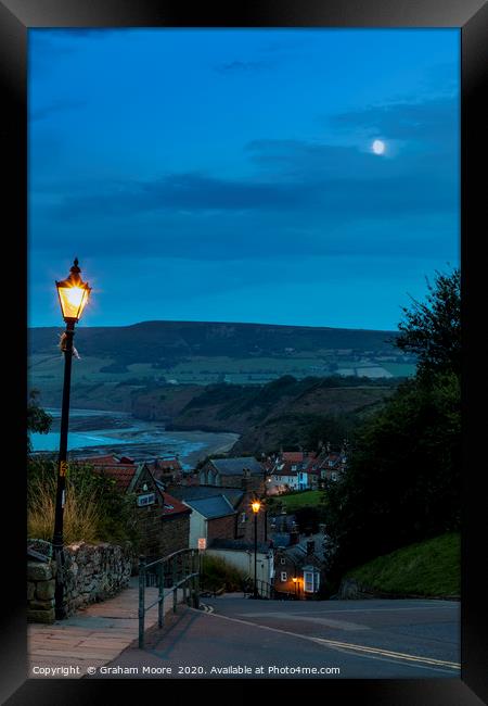 Robin Hoods Bay street evening Framed Print by Graham Moore