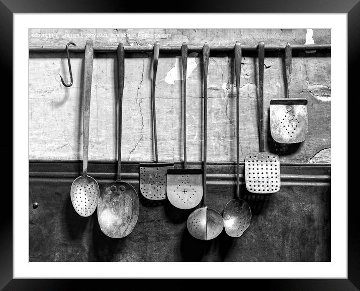 Old fashioned kitchen utensils Framed Mounted Print by Graham Moore