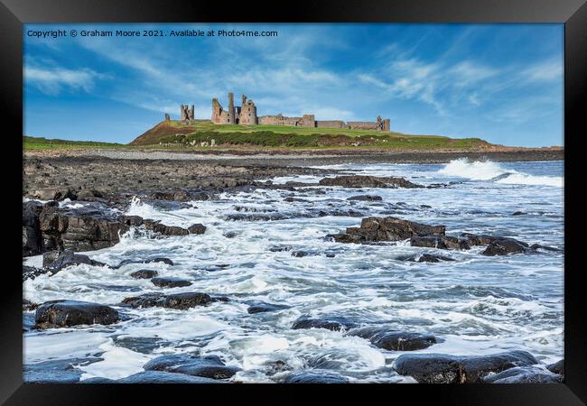Dunstanburgh Castle from the south Framed Print by Graham Moore