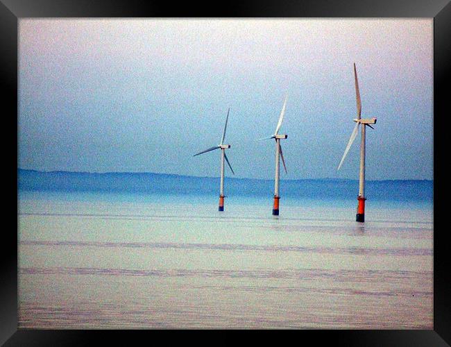 windmills at sea Framed Print by TERENCE O'NEILL