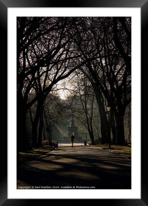 Jogger in the park Framed Mounted Print by Paul Madden