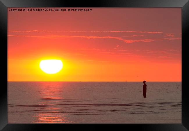  Big orange light in the sky over the water Framed Print by Paul Madden