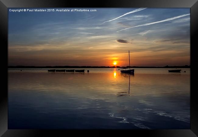 Boats on the lake at sunset Framed Print by Paul Madden