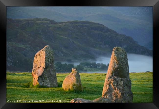 Dawn mist at the Neolithic stones Framed Print by Malcolm Snook