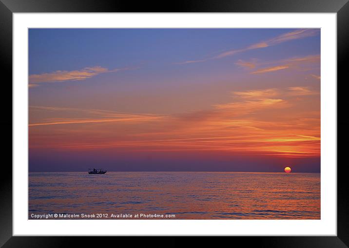Fishing boat at sunset Framed Mounted Print by Malcolm Snook