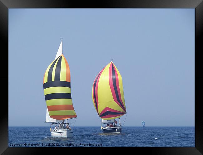 Colourful spinnakers Framed Print by Malcolm Snook