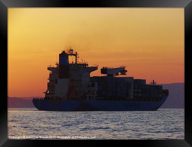 Container ship sunset Framed Print by Malcolm Snook