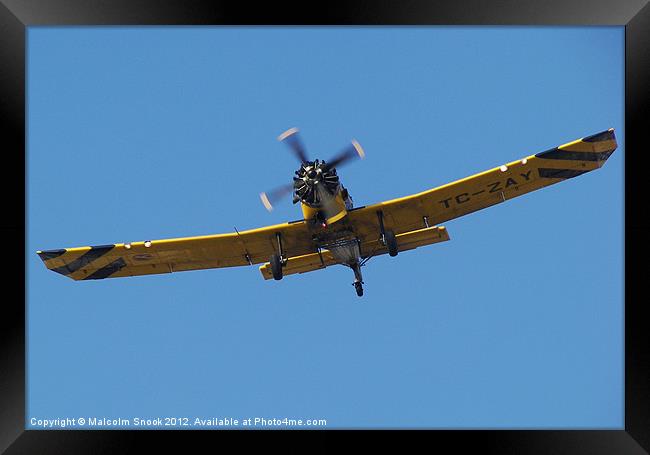 Low flying cropsprayer Framed Print by Malcolm Snook