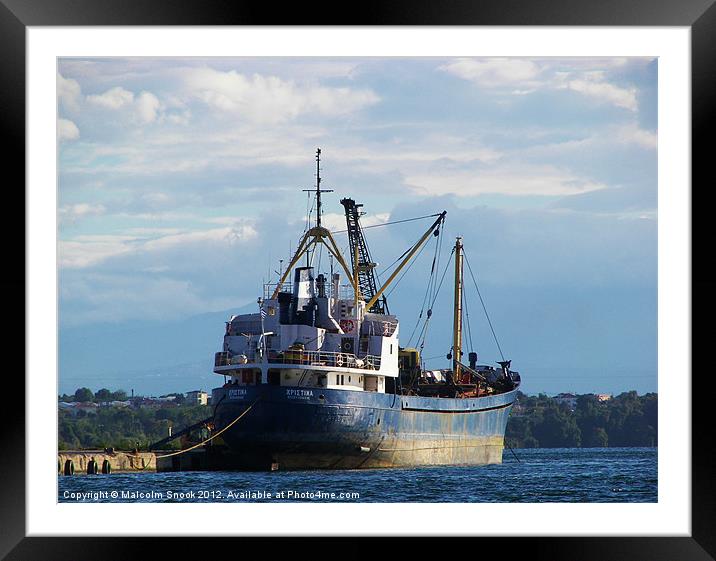Cargo ship in the islands Framed Mounted Print by Malcolm Snook