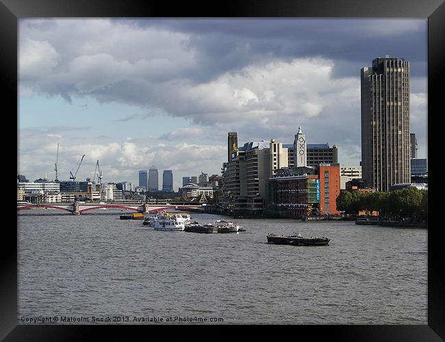 Oxo building to Canary Wharf Framed Print by Malcolm Snook