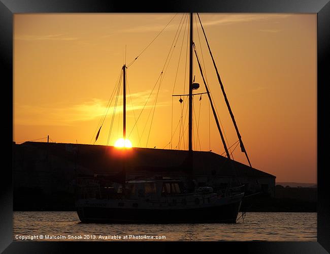 Ketch at sunset Framed Print by Malcolm Snook