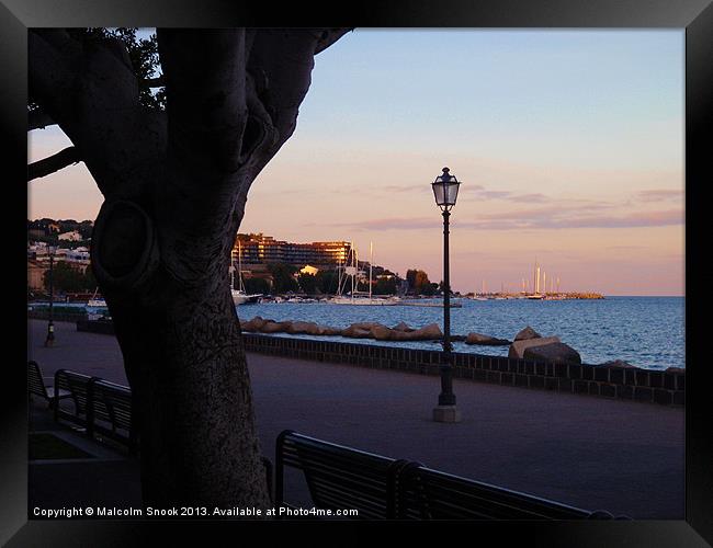 Milazzo in Sicily at dusk Framed Print by Malcolm Snook