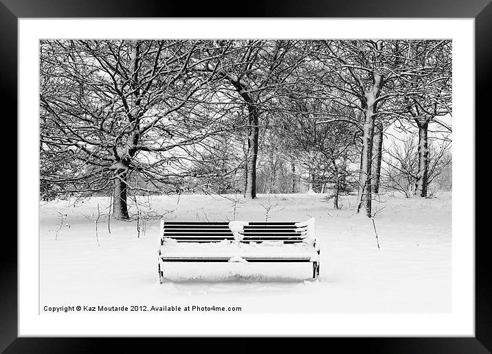 Snow covered park bench Framed Mounted Print by Kaz Moutarde