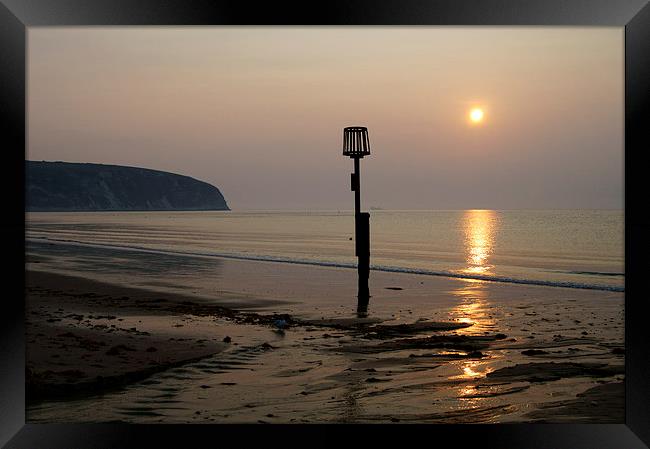 Sunrise over Swanage Bay, Dorset Framed Print by Darren Galpin