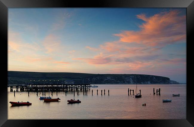 Swanage Pier & Ballard Down at Sunset Framed Print by Darren Galpin