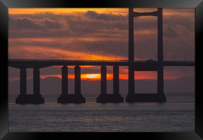 sunsetting under the bridge  Framed Print by kevin murch
