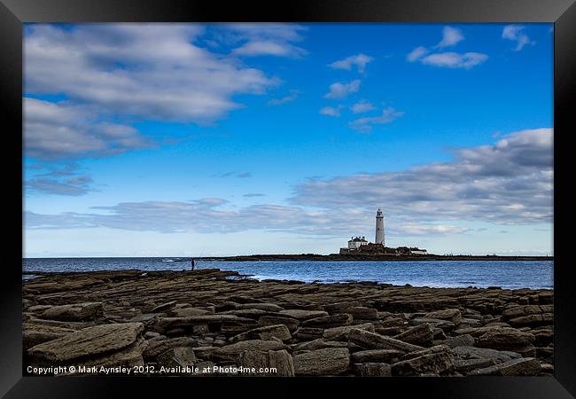 The fisherman and the lighthouse. Framed Print by Mark Aynsley