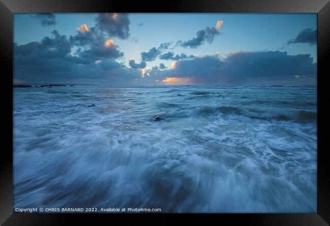 Crashing waves at Sandymouth Bay in North Cornwall at sunset Framed Print by CHRIS BARNARD