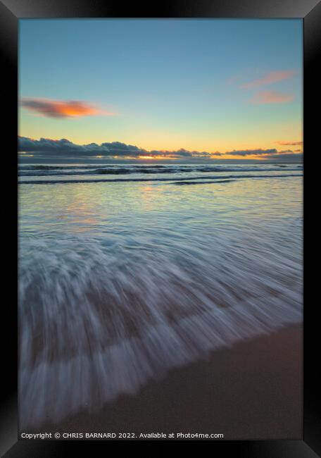 Waves At Sunset Framed Print by CHRIS BARNARD