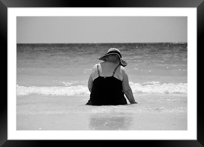 looking for shells Framed Mounted Print by John Cunha