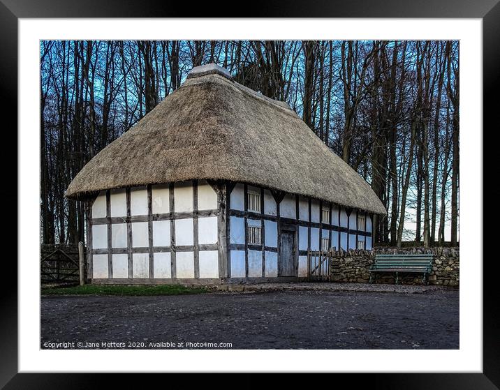 Thatched Roof Framed Mounted Print by Jane Metters