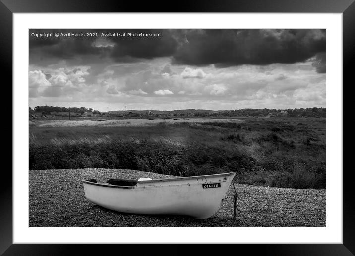 Lonely boat waiting for adventure Framed Mounted Print by Avril Harris