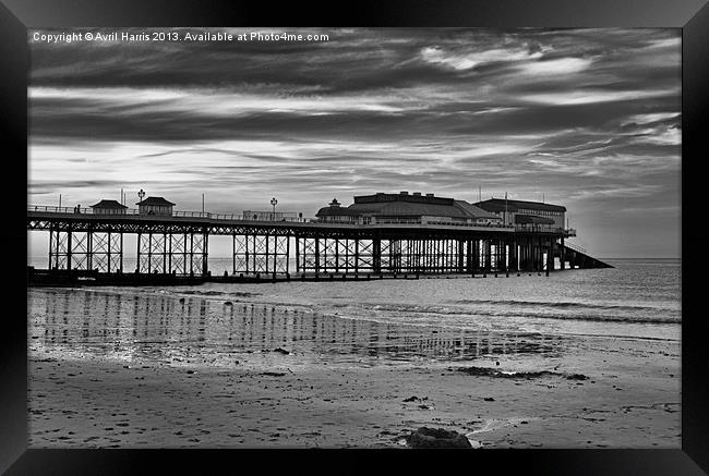 Cromer Pier in black and white Framed Print by Avril Harris
