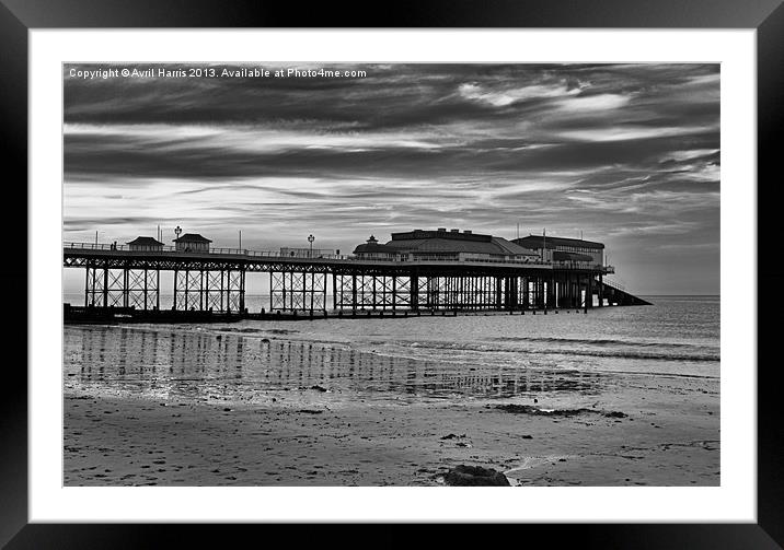 Cromer Pier in black and white Framed Mounted Print by Avril Harris
