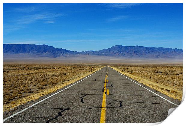 Highway through vast empty spaces, Nevada Print by Claudio Del Luongo