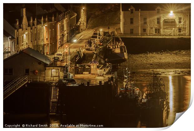 Fishing vessels moored to Portree quay at night Print by Richard Smith