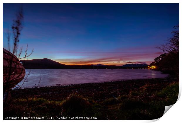 Loch Portree sunrise viewed from the grassy shore  Print by Richard Smith