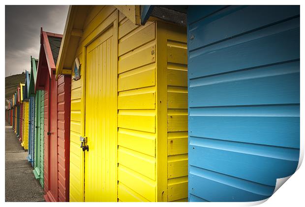 Whitby beach huts Print by ian staves