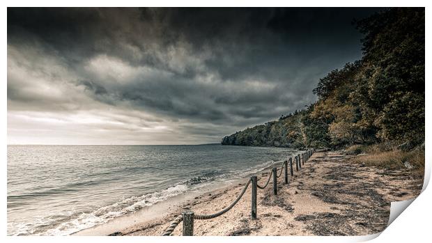 Dark Skies over the beach Print by Ian Johnston  LRPS