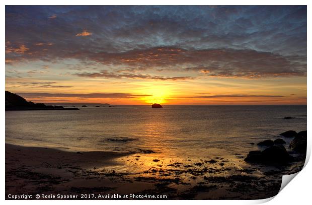 Sunrise over Black Rock at Millendreath Beach Looe Print by Rosie Spooner