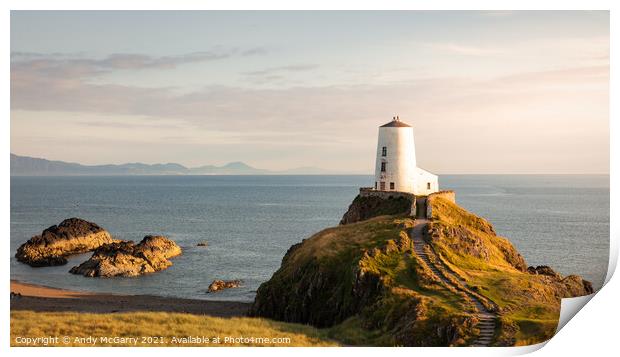 Radiant Sunset over Llanddwyn Lighthouse Print by Andy McGarry