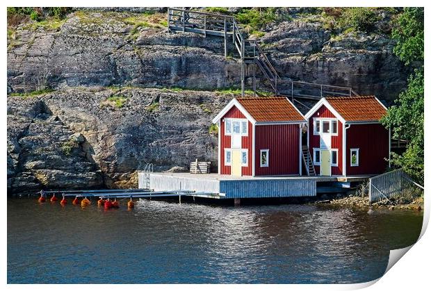 Boathouses on Orust Island in Western Sweden Print by Martyn Arnold