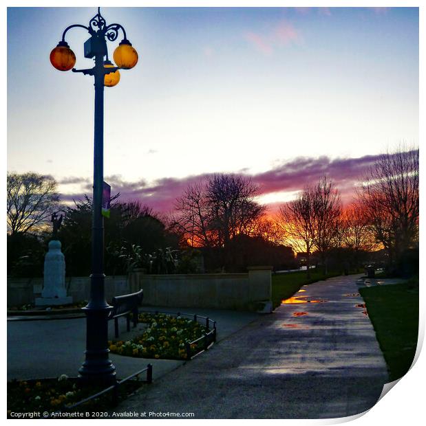 Hythe War Memorial at sunset after the rain  Print by Antoinette B