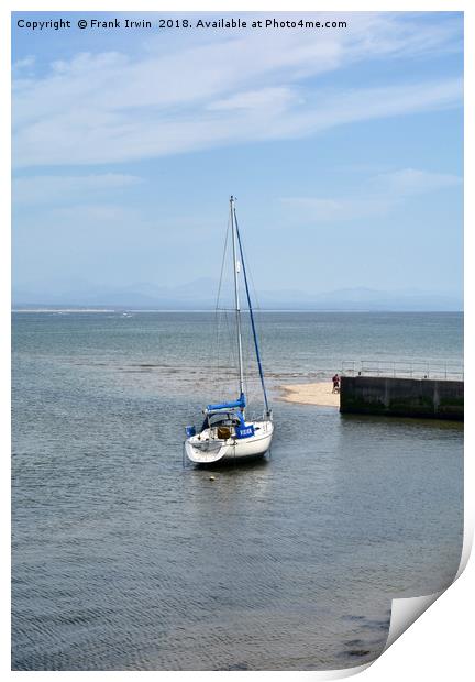 A yacht lies at anchor in Abersoch Harbour Print by Frank Irwin