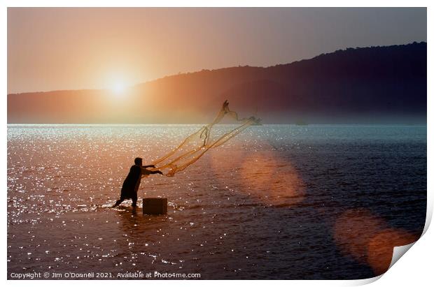 A Thai fisherman at sunrise Print by Jim O'Donnell
