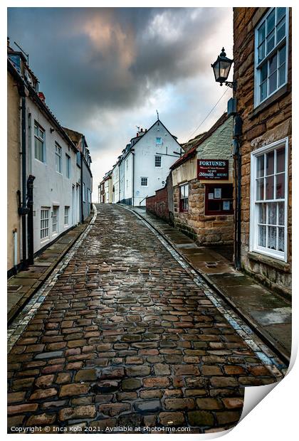 Whitby's Cobbled Streets and Fortune's Kipper House Print by Inca Kala