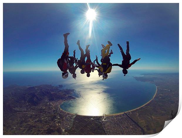 Skydive freefly over the bay Print by Ewan Cowie