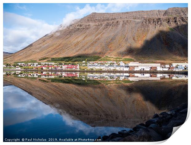 Isafjordur town in Iceland reflecting in the fjord Print by Paul Nicholas