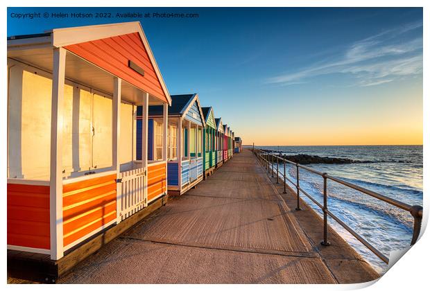 A row of pretty beach huts at Southwold  Print by Helen Hotson