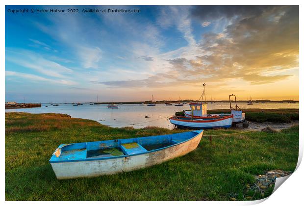 Beautiful sunset over old fishing boats in Suffolk Print by Helen Hotson