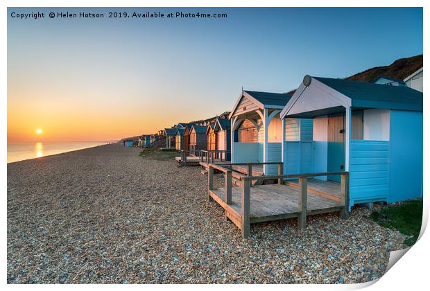 Sunset over Beach Huts Print by Helen Hotson