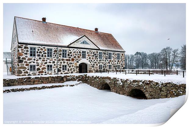 Hovdala Castle in a Winter Wonderland Print by Antony McAulay