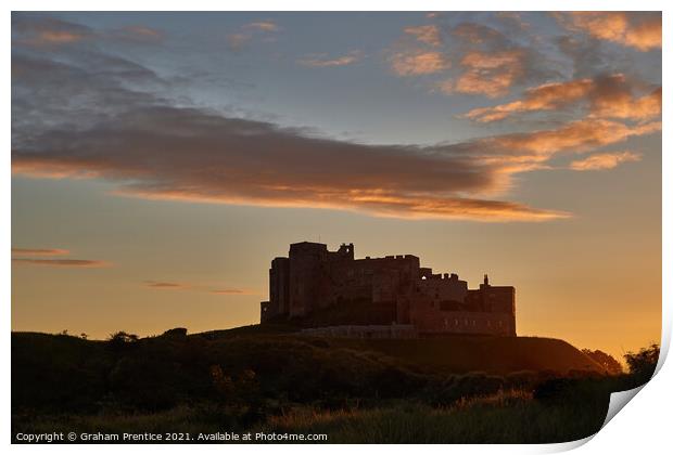 Bamburgh Castle  at Sunset Print by Graham Prentice