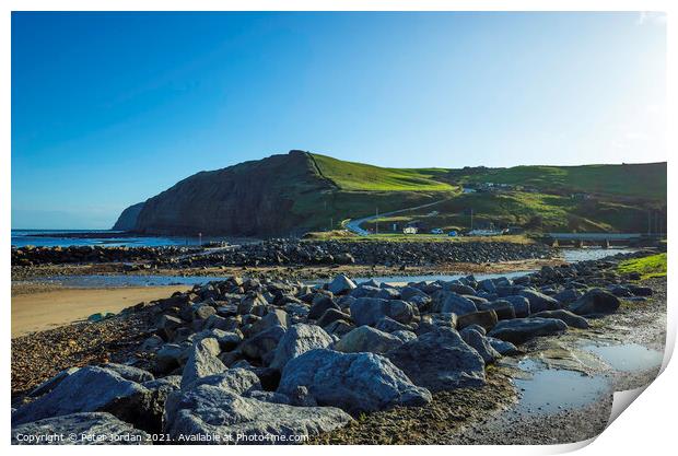 Beaches at Skinningrove North Yorkshire England UK have rock armour to prevent erosion Print by Peter Jordan