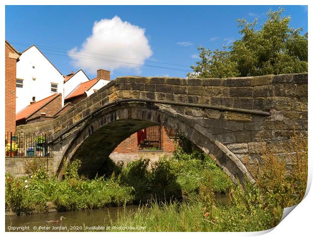 An old pack horse bridge joining the High Street t Print by Peter Jordan